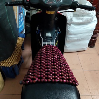 miếng lót yên xe máy hạt gỗ