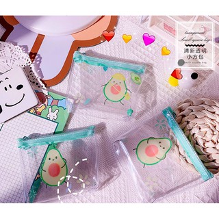 Bóp mini trong suốt trái bơ