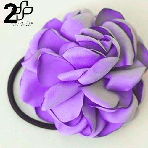 Cột tóc hình bông hoa trà