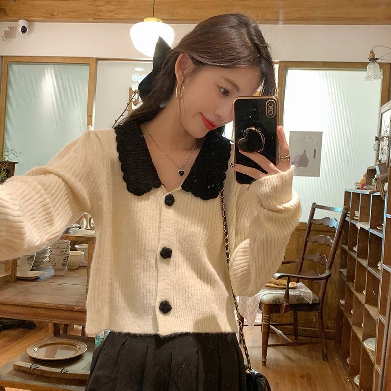 Áo khoác cardigan dệt kim tay dài dáng rộng màu tương phản thời trang thu đông mới cho nữ