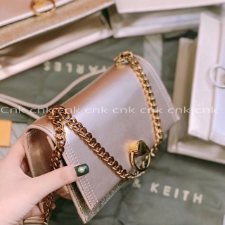 Túi CNK khoá tròn màu vàng