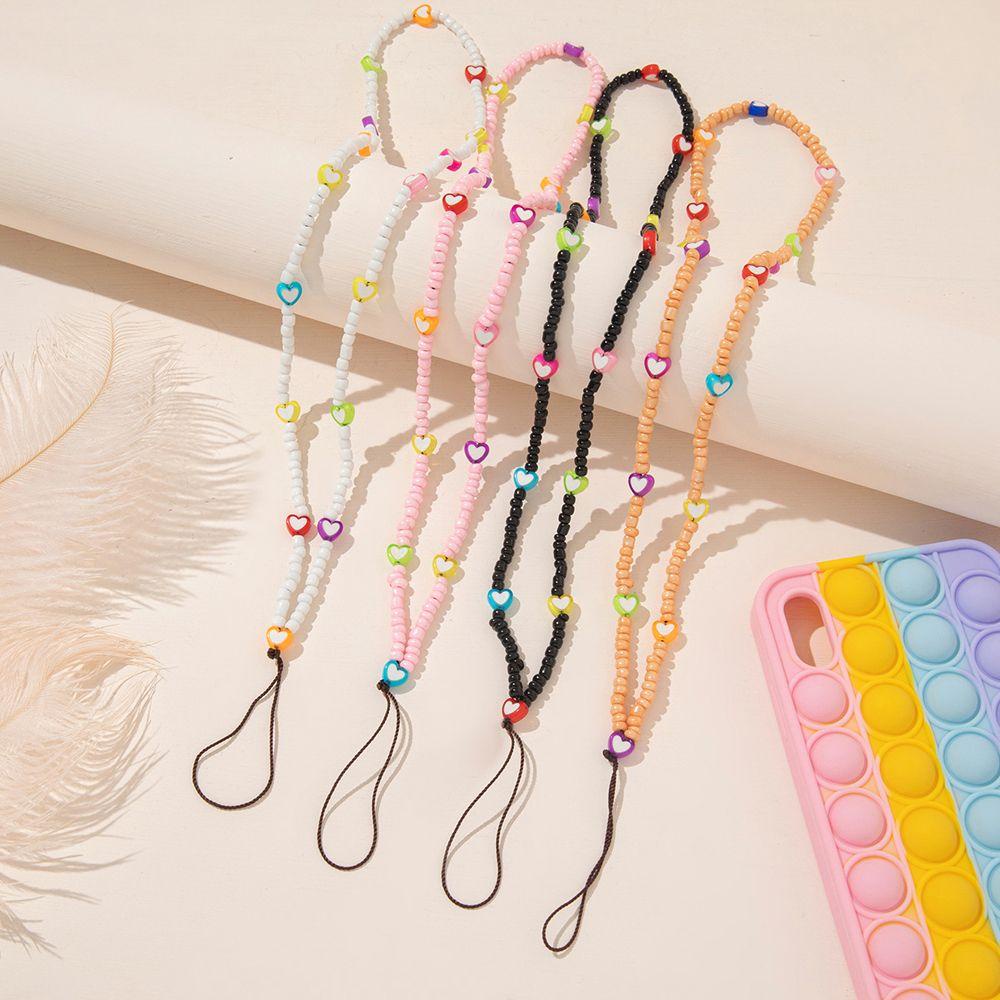Dây Đeo Điện Thoại Xỏ Hạt Hình Trái Tim Nhiều Màu Chống Thất Lạc Cho Nữ