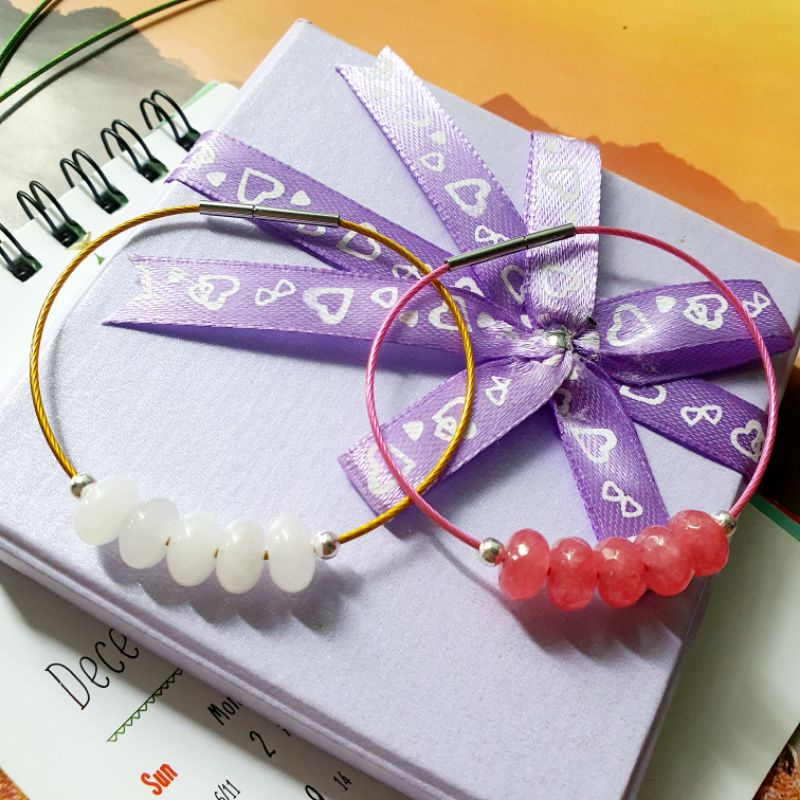 Vòng tay dây cước 1mm mix 5 hạt đồng điếu