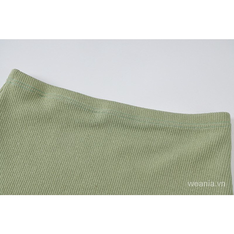 Áo tank top hở lưng và chân váy cạp cao dáng ôm thời trang cho nữ