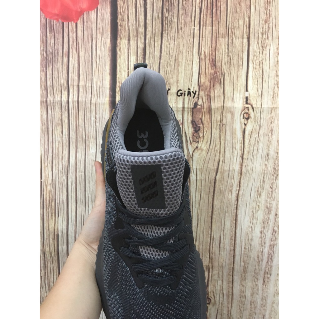 Giày thể thao sneaker Alphabounce xám gót vàng bản trung Hot trend