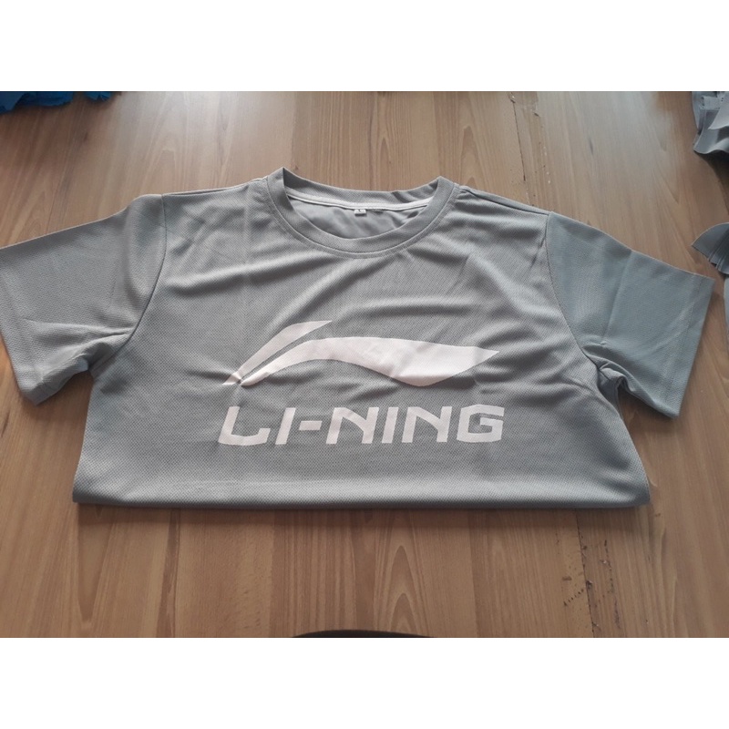 Áo tập cầu lông li.ning thông dụng toàn thế giới giá rẻ như tự may