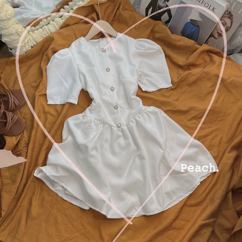Đầm trắng tay phồng xòe tinh khôi đính nút Hanny Dress