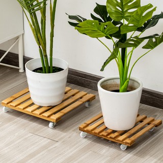 Kệ để chậu cây bằng gỗ tre sáng đẹp, có bánh xe xoay 360 độ, di chuyển dễ dàng. Kích thước: 30x30cm