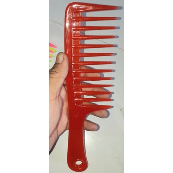 Một chiếc lược dành cho tóc xoăn_ tóc uốn bằng nhựa