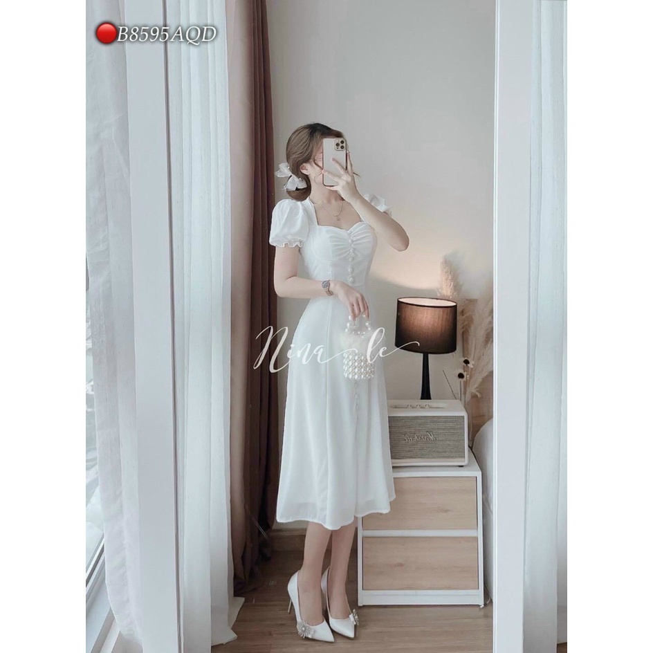 Đầm trắng tinh khôi dáng thân dài xẻ tà họa tiết cúc phối ống tay phồng siêu dễ thương vừa giản dị vừa thanh lịch