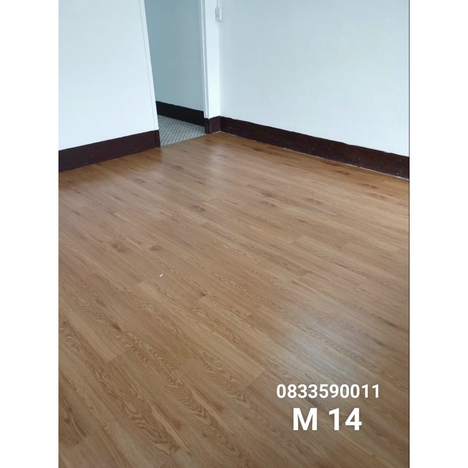 Combo 7 miếng sàn nhựa giả gỗ có keo sẵn . Nhận thi công