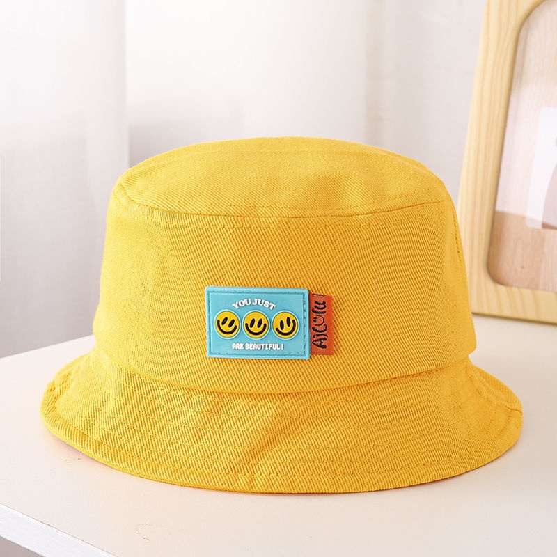 Mũ bucket da họa tiết mặt cười dễ thương cho bé