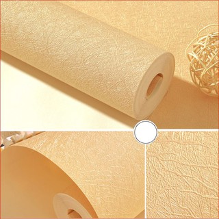 1 cuộn dài 5m ngang 60cm giấy dán tường nhám màu vàng nghệ, có thể lau được khi bẩn, có keo sẵn