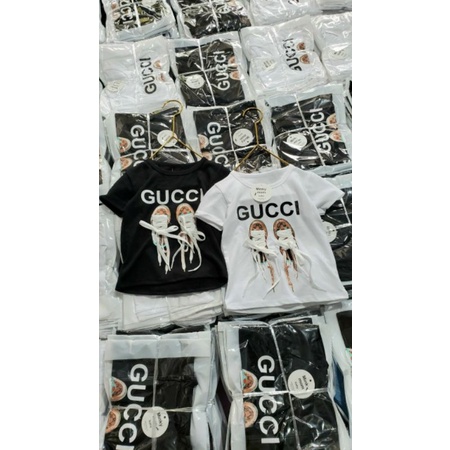 Áo cộc tay in hình đôi giày cho bé gái chất cotton tàu
