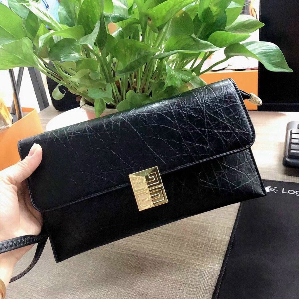 Ví cầm tay nữ cao cấp da nhám màu đen sang trọng dành cho quý cô trendy