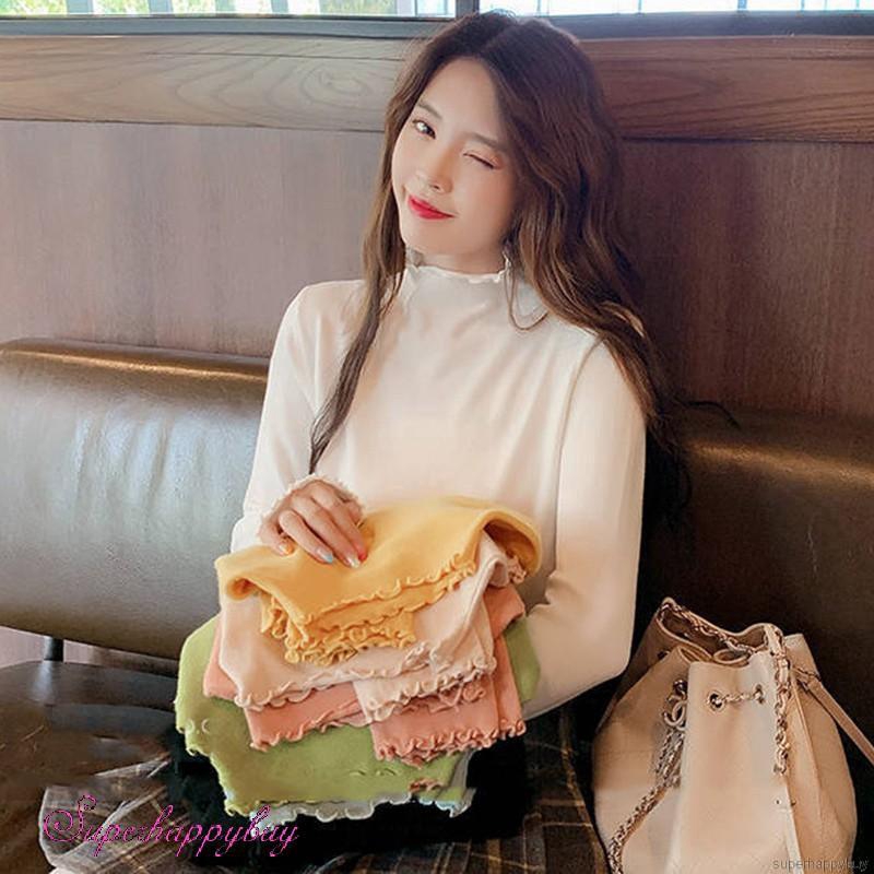 Áo thun tay dài cổ lọ màu trơn dáng rộng thời trang cho nữ