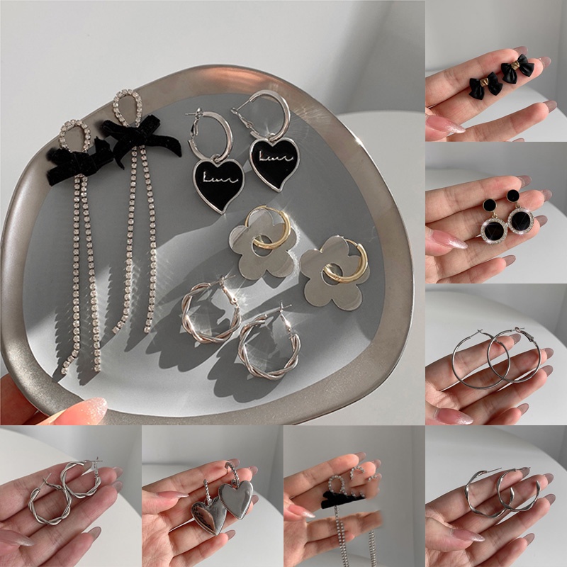 Bông tai dài hình nơ tua rua đơn giản