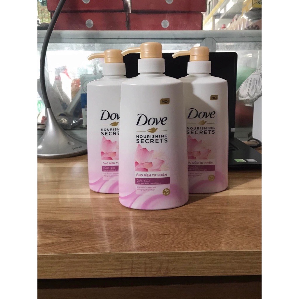 DẦU GỘI  DOVE  HOA SEN  VÀ NƯỚC GẠO 640G Óng mềm tự nhiên