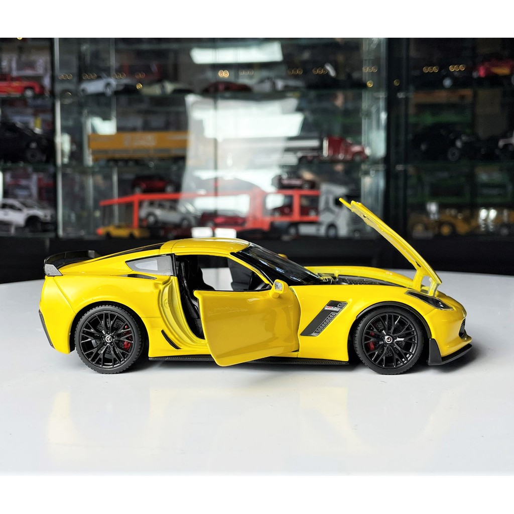 Mô hình xe kim loại Chevrolet Corvette Z06 tỉ lệ 1:24 hãng Welly màu vàng