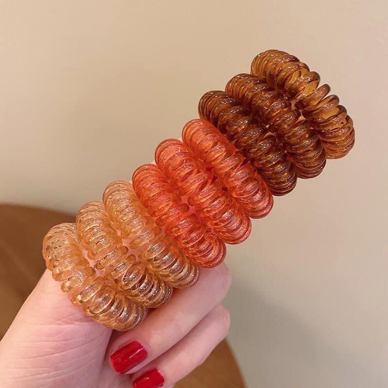 1 dây thun  cột buộc tóc tóc lò xo màu hồng