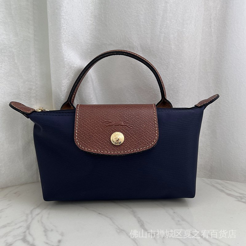 Túi Đựng Điện Thoại / Mỹ Phẩm / Bánh Bao mini Khô Yi Tay Cầm Đơn Cho Nữ