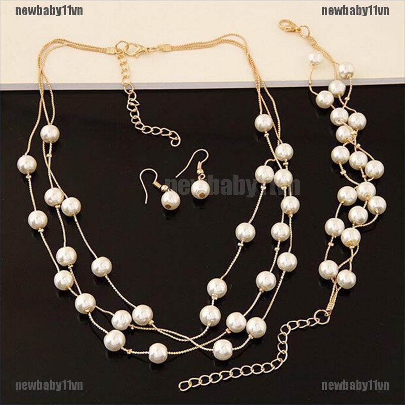 Bộ dây chuyền bông tai và vòng tay mạ bạc đính ngọc trai nhân tạo thời trang
