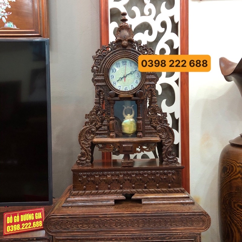 Đồng hồ gỗ mun, mẫu quả lắc gỗ mun đuôi công để bàn cao 66cm