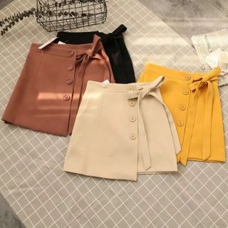 Chân váy nơ cúc xinh xắn