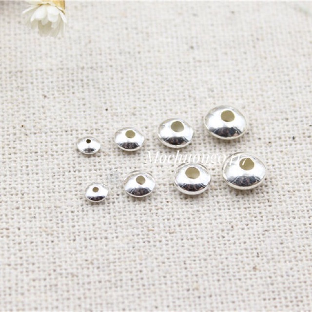 Charm chặn bạc trơn - MH330