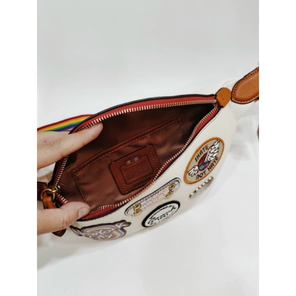 Túi bao tử Coa**ch da thật xịn xò