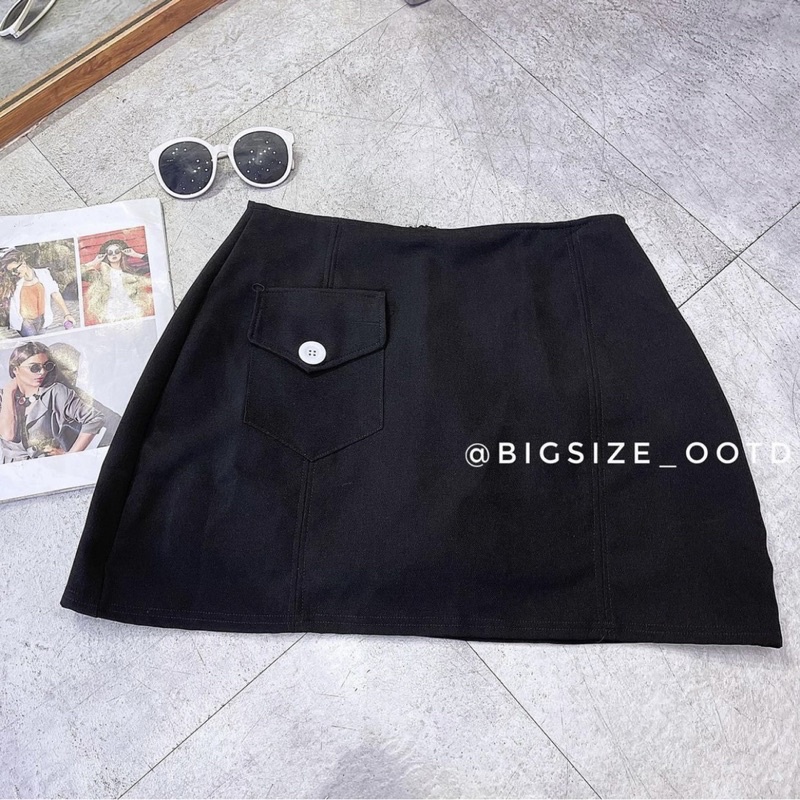 Váy quần bigsize túi nắp nút trắng