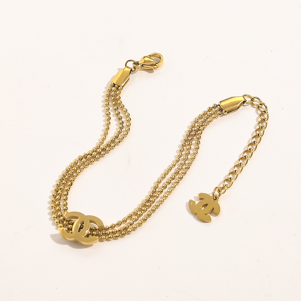 Vòng Tay Bằng Thép Titan Hai Lớp Rỗng Tinh Tế In Logo Chữ CC