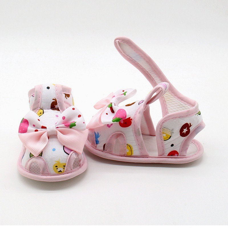 Giày sandal quai hậu họa tiết hoạt hình đính nơ chống trượt cho bé