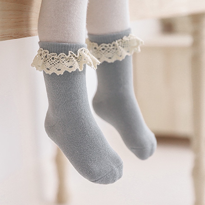 Vớ cotton mềm màu trơn phối ren nhún bèo giữ ấm mùa đông cho bé sơ sinh