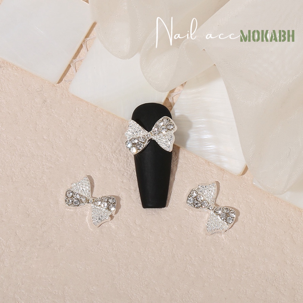 Set 20 Phụ Kiện Trang Trí Móng Tay Hình Nơ Trái Tim Bằng Hợp Kim Chống Rỉ Sét