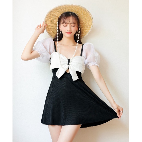 Bộ đồ bơi nữ liền thân dáng váy nơ xinh tay phối voan trắng