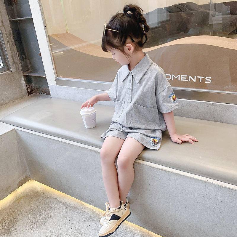 Set trang phục hai món áo tay ngắn dáng rộng cổ bẻ và quần đùi thời trang Hàn Quốc mùa hè thể thao dành cho bé gái