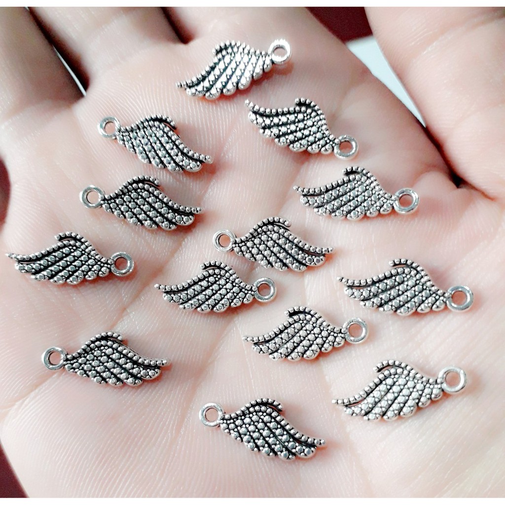 Sỉ charm bạc cổ chất liệu Hợp Kim handmade : 50g = 25k / 1 gói
