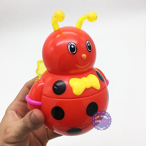 Đồ chơi lật đật ong bằng nhựa dùng pin có đèn nhạc