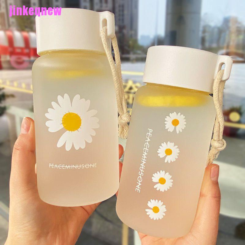 Bình nước nhựa JINHF trong mờ in họa tiết hoạt hình hoa cúc 500ml