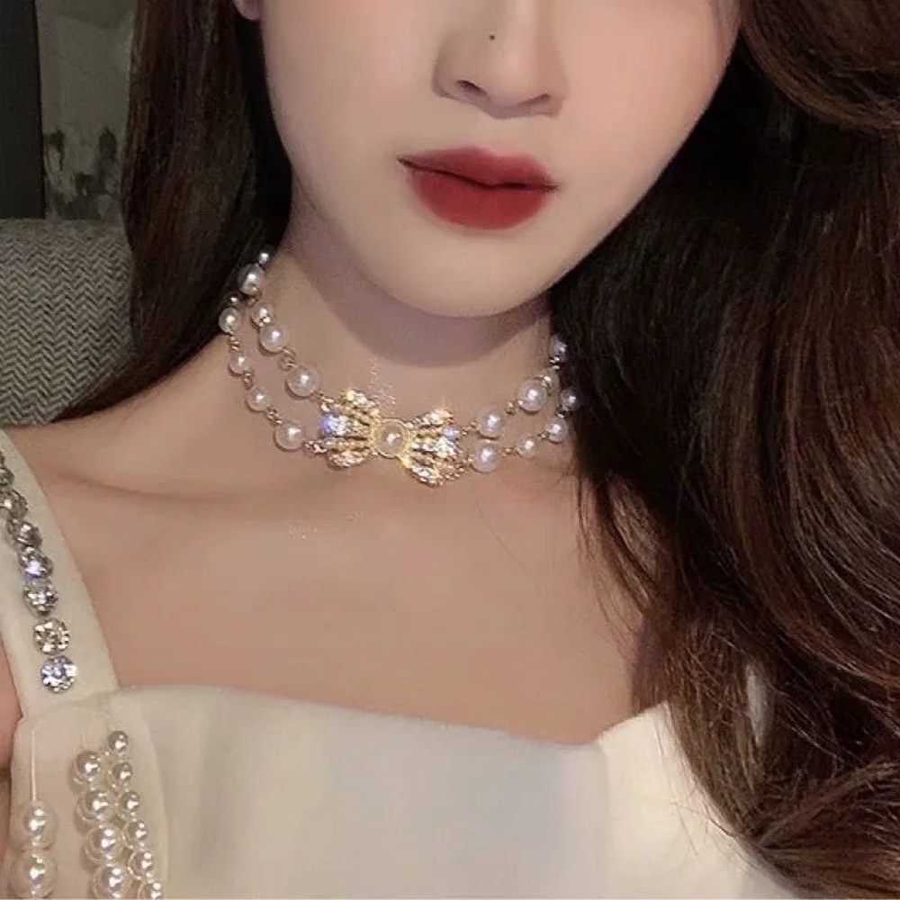 Vòng cổ choker hai lớp đính ngọc trai và nơ thời trang