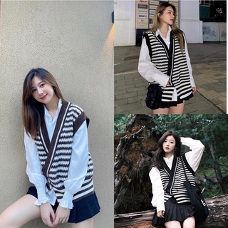 Set 2 sản phẩm sơ mi tay bồng mix cùng áo len gile