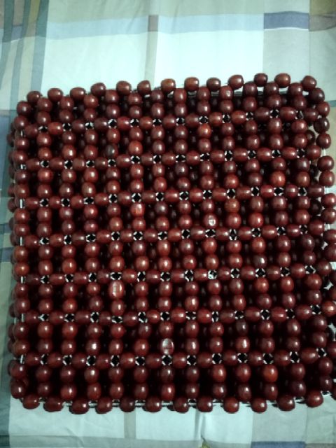 Miếng lót yên xe máy hạt gỗ