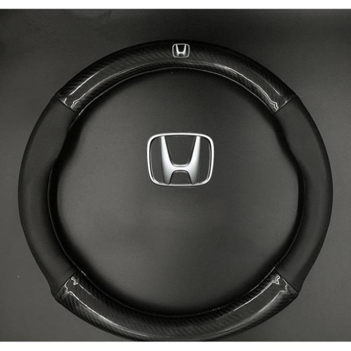 Bọc vô lăng cacbon Chống trượt không gây mùi có gắn logo các hãng xe toyota ford honda hyundai kia mitsubishi size 38cm