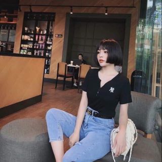 Áo phông cúc cài cổ túi zip