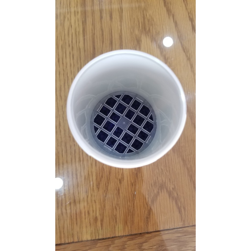 Hộp hút ẩm cho máy trợ thính .