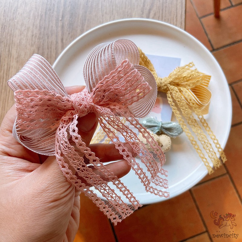 Bộ 2 kẹp tóc đính nơ ren và trang trí nhân vật hoạt hình xinh xắn đáng yêu cho bé gái