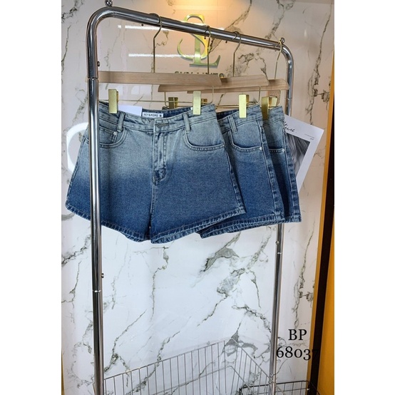 Quần short jean loang
