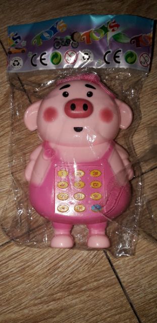 Điện thoại mô hình Heo con bằng nhựa có nhạc tặng kèm PIN