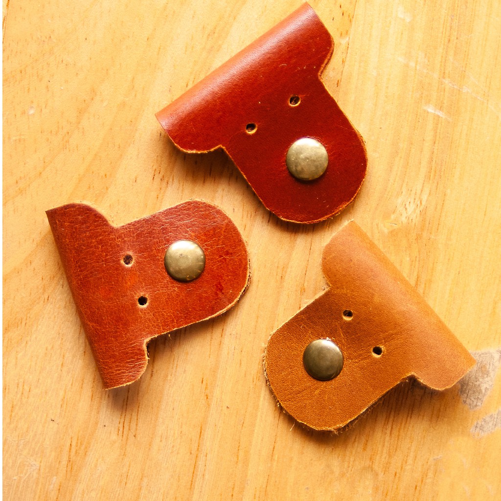 [SALES SỐC] Kẹp Tai Nghe Hình Cún Dễ Thương - Da Thật, Nút Bấm Xi Đồng Xịn - Mua 4 tặng 1 | BigBuy360 - bigbuy360.vn